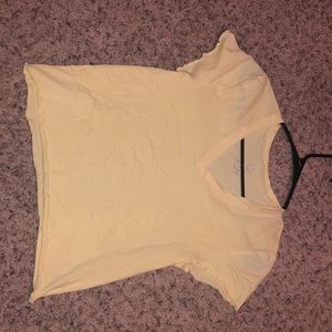 black Tshirt and yellow Vneck shirt